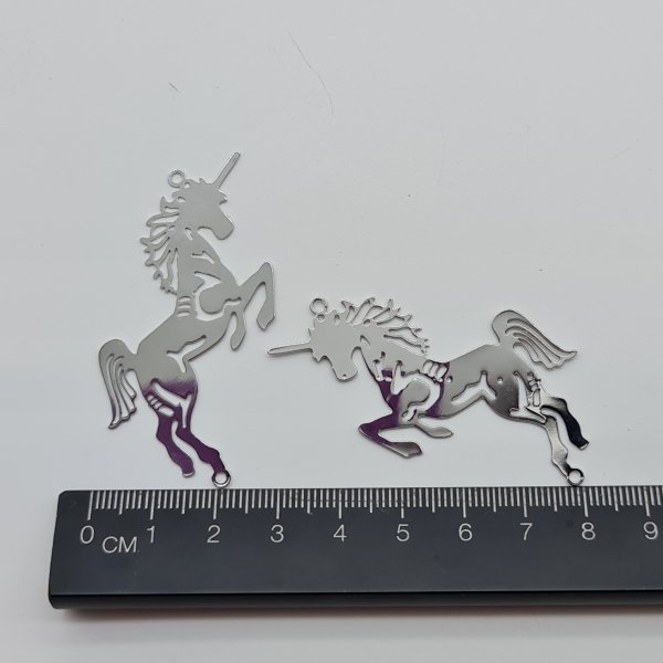 Unicorn Filigree Charm Stainless Steel #1. Charms and pendants for suncatchers, jewelry and craft projects.