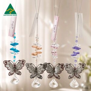 Four silver filigree butterfly suncatchers with blue, peach, pink and purple octagon crystals and clear diamond pendants.