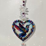 colorful hummingbird crystal suncatcher with rainbows