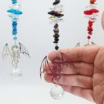 gemstone dragon suncatchers size in hand