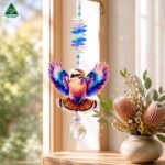 rainbow kookaburra suncatcherin a window