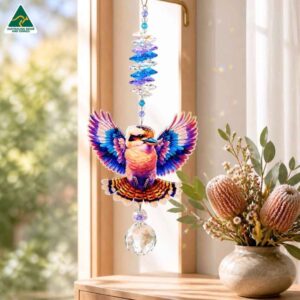 rainbow kookaburra suncatcherin a window