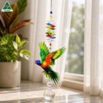 lorikeet suncatcher in a window
