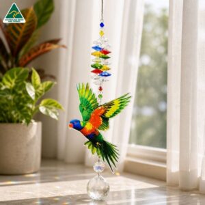 lorikeet suncatcher in a window