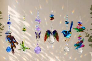 Colourful handmade crystal suncatchers with rainbow reflections